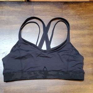 Black on black camo with gold lines on the camo